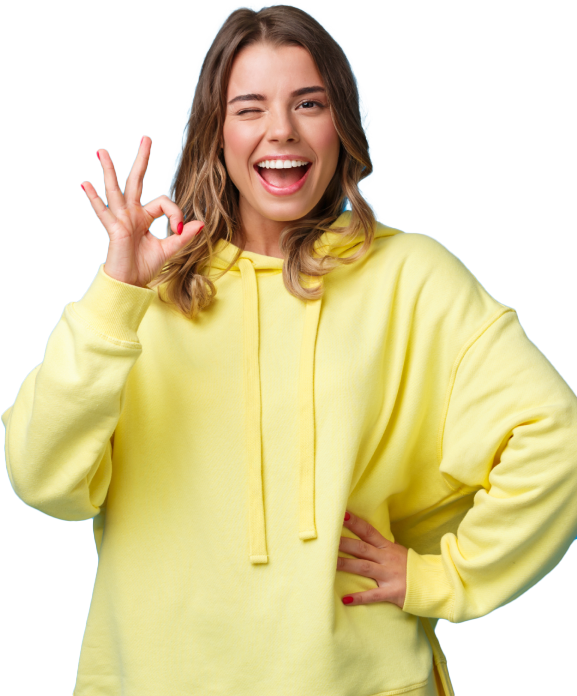 A young woman in a yellow sweatshirt, women-smiling, making the ok sign